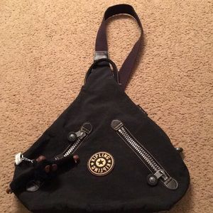 Kipling sling with zippers on both sides and back